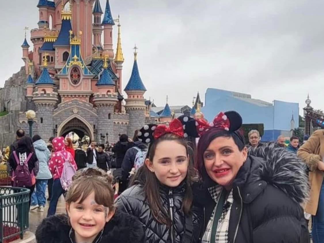 Children at the Disneyland Paris castle on a Nothing Is Impossible trip